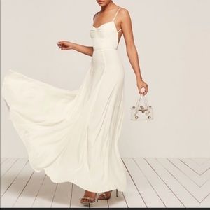 Reformation white open back, floor length dress with a sweetheart neckline.